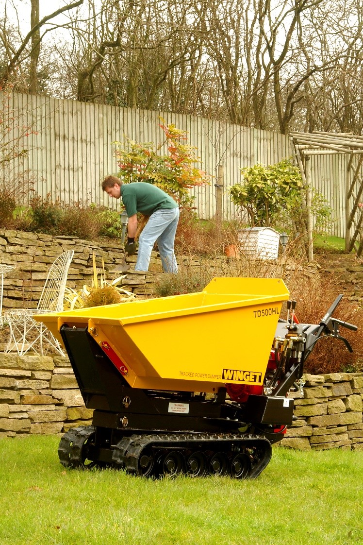 Winget TD500HL machinery in garden with man in background